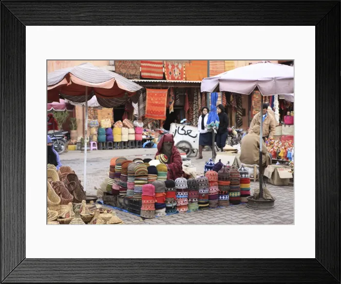 Framed Print : Market trader on hat stall, Marrakech, Morocco, North Africa, Africa Framed Print : Market trader on hat stall, Marrakech, Morocco, North Africa, Africa