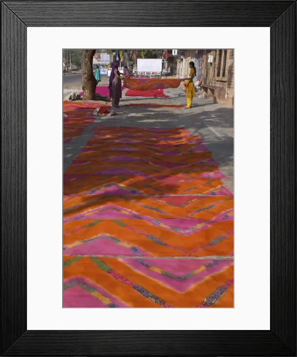 Framed Print : Women laying newly printed dupattas out to dry in the street, Jodhpur, Rajasthan Framed Print : Women laying newly printed dupattas out to dry in the street, Jodhpur, Rajasthan