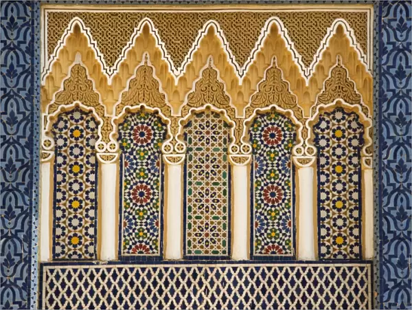 Ornate architectural detail above the entrance to the Royal Palace, Fez