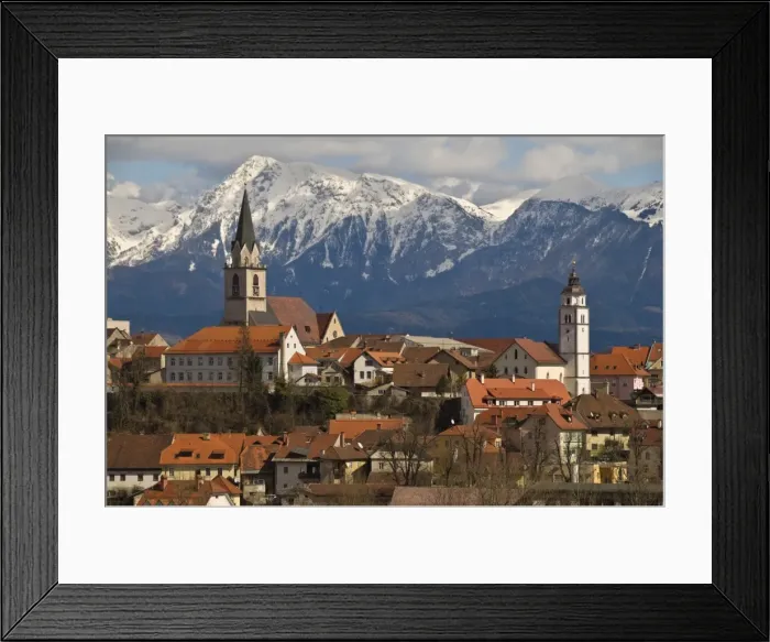 Framed Print : St. Cantianus Church in the foreground and the Kamnik Alps behind, Kranj Framed Print : St. Cantianus Church in the foreground and the Kamnik Alps behind, Kranj
