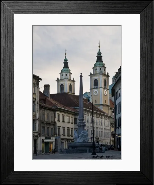 Framed Print : View towards the Cathedral of St. Nicholas along the streets of the old town of Ljubljana Framed Print : View towards the Cathedral of St. Nicholas along the streets of the old town of Ljubljana