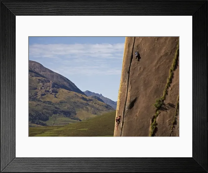 Framed Print : Two rock climbers making their way up a very difficult route on the 450 metre monolith of Karimbony Framed Print : Two rock climbers making their way up a very difficult route on the 450 metre monolith of Karimbony