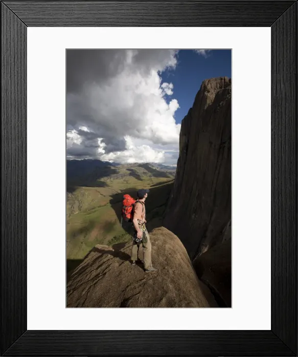 Framed Print : A climber looks up towards the 800 metre Tsaranoro Be (Big Tsaranoro) Monolith Framed Print : A climber looks up towards the 800 metre Tsaranoro Be (Big Tsaranoro) Monolith