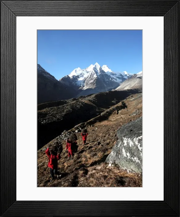 Framed Print : Three Buddhist monks carry firewood high above the mountain village of Khare Framed Print : Three Buddhist monks carry firewood high above the mountain village of Khare