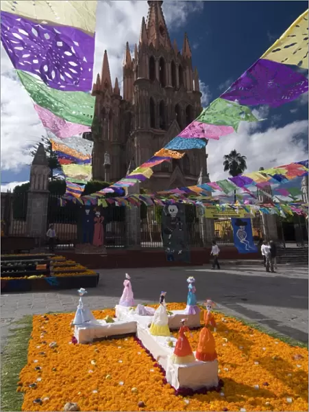 Decorations for the Day of the Dead festival with Parroquia de San Miguel Arcangel in the background, Plaza Principal, San Miguel de Allende, Guanajuato, Mexico