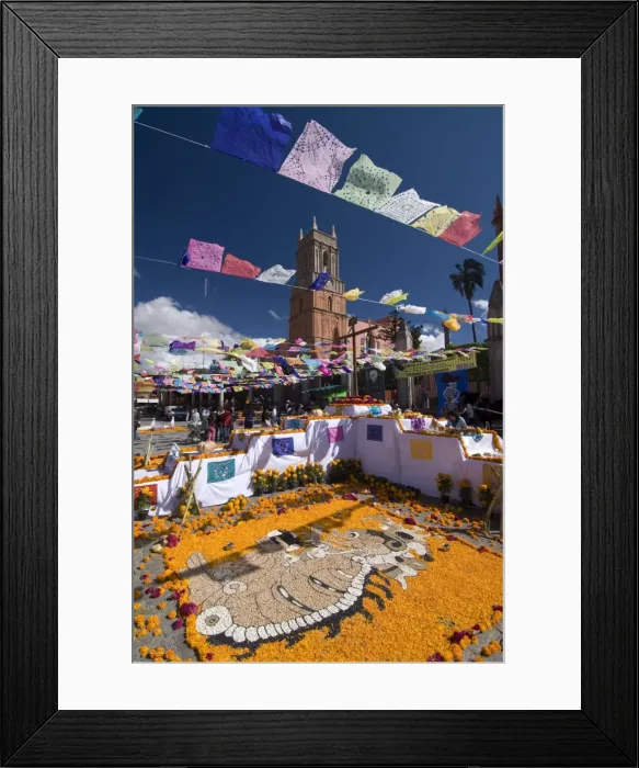 Framed Print : Decorations for the Day of the Dead festival with Iglesia de San Rafael in the background Framed Print : Decorations for the Day of the Dead festival with Iglesia de San Rafael in the background