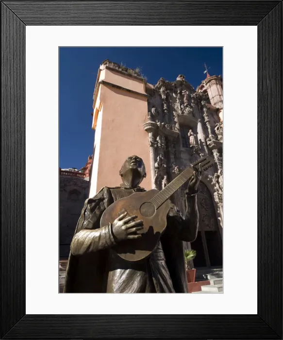 Framed Print : Bronze statue of a singing Mexican, in front of the Temple of San Diego Framed Print : Bronze statue of a singing Mexican, in front of the Temple of San Diego