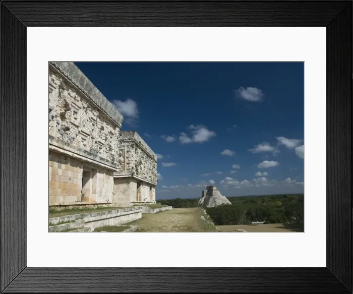 Framed Print : Palacio del Gobernador (Governors Palace) on left and Casa del Adivino