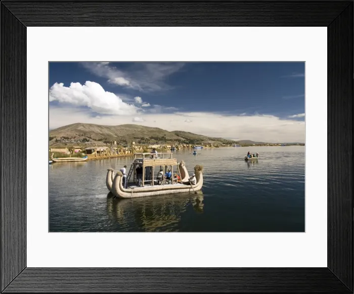 Framed Print : Tourists on reed boat and the floating islands of the Uros people, Lake Titicaca Framed Print : Tourists on reed boat and the floating islands of the Uros people, Lake Titicaca