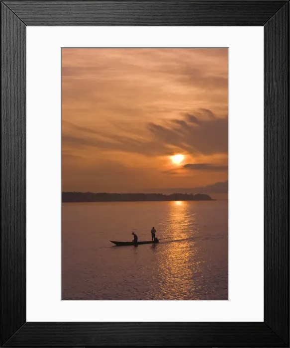 Framed Print : Fishermen at sunset on the Amazon River, Brazil, South America