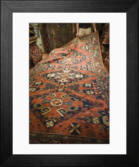 Framed Print : Man displaying traditional rug for sale, Grand Bazaar (Great Bazaar), Istanbul Framed Print : Man displaying traditional rug for sale, Grand Bazaar (Great Bazaar), Istanbul