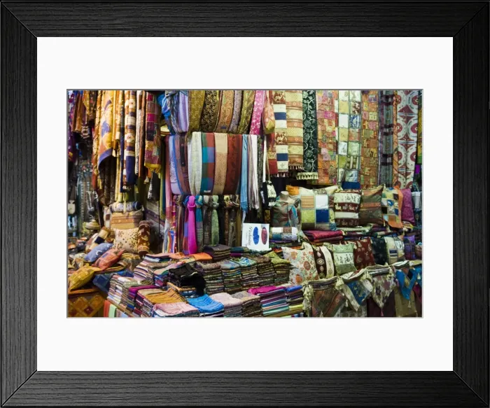 Framed Print : Fabrics, rugs, scarves, cushions for sale, Grand Bazaar (Great Bazaar)