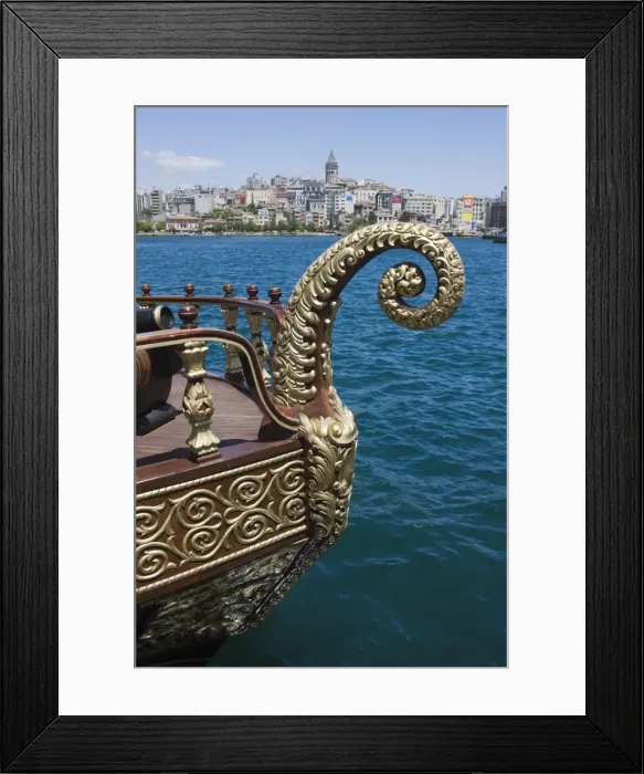 Framed Print : Decorative boat on the Golden Horn with the Galata Tower and Beyoglu district in the background Framed Print : Decorative boat on the Golden Horn with the Galata Tower and Beyoglu district in the background