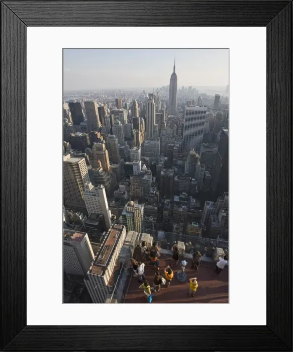 Framed Print : Tourists photographing view of the Empire State Building from the top of the General Electric Building, (Top of the Rock), Rockefeller Centre, Manhattan, New York, United States of America Framed Print : Tourists photographing view of the Empire State Building from the top of the General Electric Building, (Top of the Rock), Rockefeller Centre, Manhattan, New York, United States of America