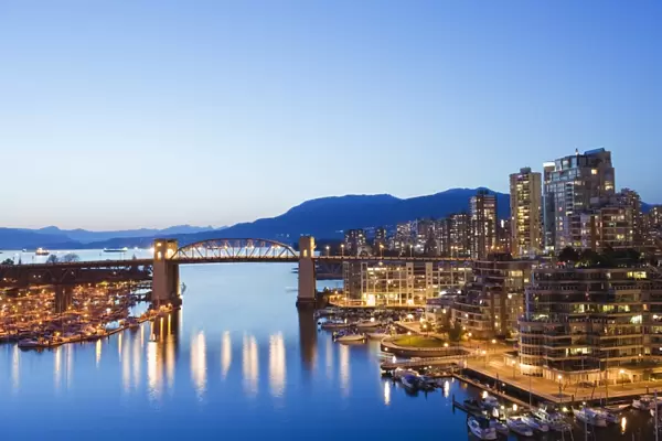 Illuminated buildings in False Creek Harbour, Vancouver, British Columbia
