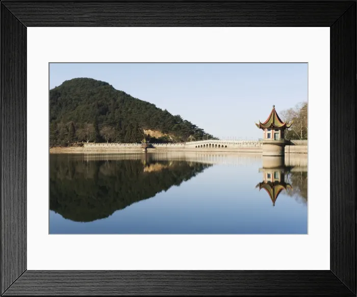 Framed Print : An ancient bridge reflected in the waters of a reservoir at Lushan mountain Framed Print : An ancient bridge reflected in the waters of a reservoir at Lushan mountain