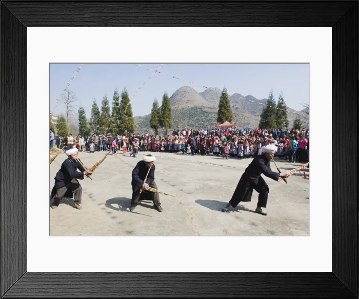 Framed Print : Men playing the lusheng at a 4 Seals Miao lunar New Year festival, Xinyao village Framed Print : Men playing the lusheng at a 4 Seals Miao lunar New Year festival, Xinyao village