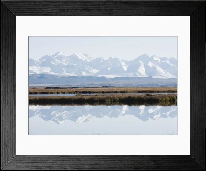 Framed Print : Snow mountains reflected in a lake, Bayanbulak, Xinjiang Province, China, Asia Framed Print : Snow mountains reflected in a lake, Bayanbulak, Xinjiang Province, China, Asia