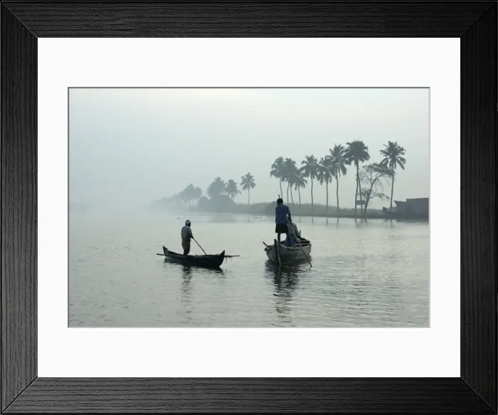 Framed Print : Local villagers paddle shell dredging canoes at sunrise on the backwaters Framed Print : Local villagers paddle shell dredging canoes at sunrise on the backwaters