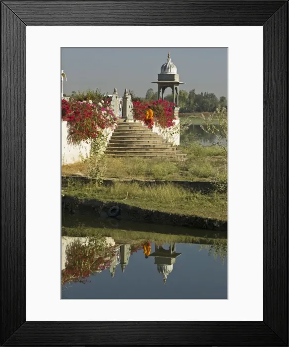 Framed Print : Reflection of monk entering the lake temple for puja at dawn, Dungarpur Framed Print : Reflection of monk entering the lake temple for puja at dawn, Dungarpur