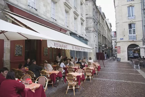 Terrace seating at restaurant in Place Saint-Pierre, Bordeaux, Gironde, France, Europe