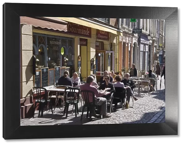 Terrace tables outside the many cafes and restaurants on Rue de Lille in the old quarter of Boulogne, Pas-de-Calais
