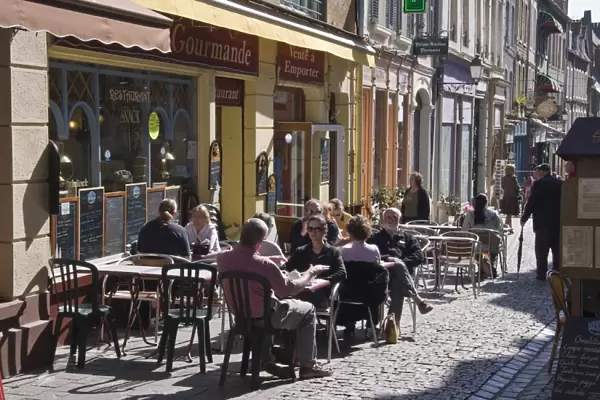 Terrace tables outside the many cafes and restaurants on Rue de Lille in the old quarter of Boulogne, Pas-de-Calais