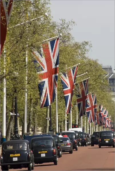 Black cabs along the Mall, London, England, United Kingdom, Europe