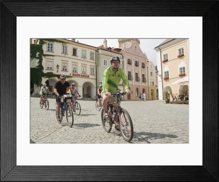 Framed Print : Cyclists riding through Namesti (square) in town of Mikulov, Brnensko Region Framed Print : Cyclists riding through Namesti (square) in town of Mikulov, Brnensko Region