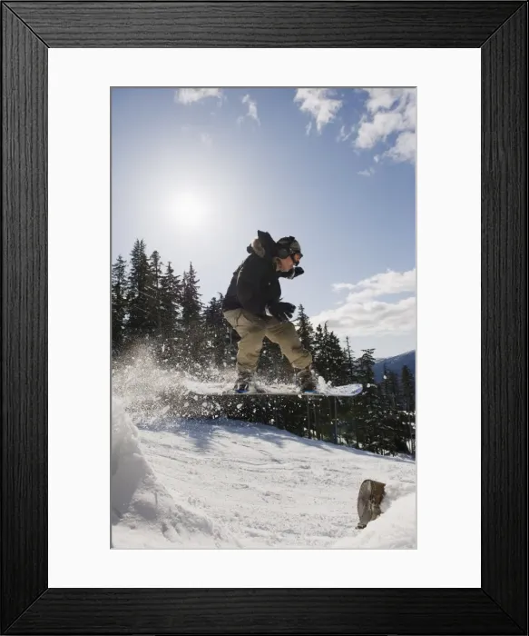 Framed Print : A snowboarder jumping at Whistler mountain resort, venue of the 2010 Winter Olympic Games Framed Print : A snowboarder jumping at Whistler mountain resort, venue of the 2010 Winter Olympic Games