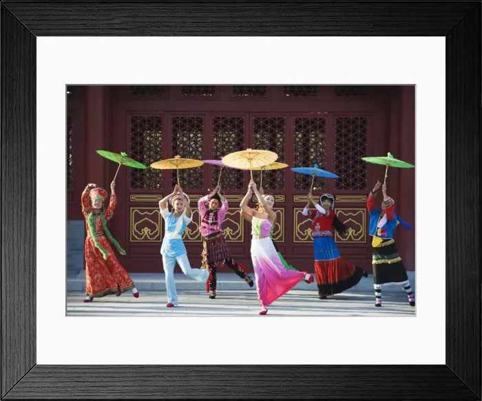 Framed Print : Girls dancing with coourful parasols at the Ethnic Minorities Park, Beijing, China, Asia