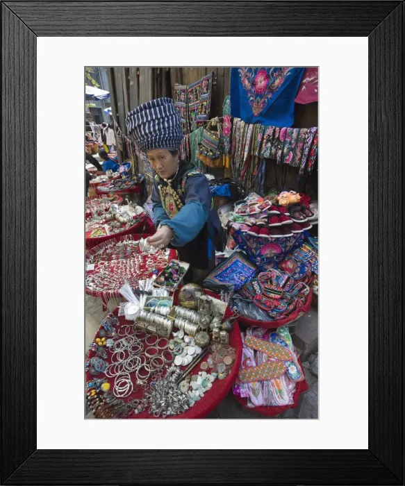 Framed Print : Woman selling ethnic souvenirs at a market in Fenghuang, Hunan Province, China, Asia Framed Print : Woman selling ethnic souvenirs at a market in Fenghuang, Hunan Province, China, Asia