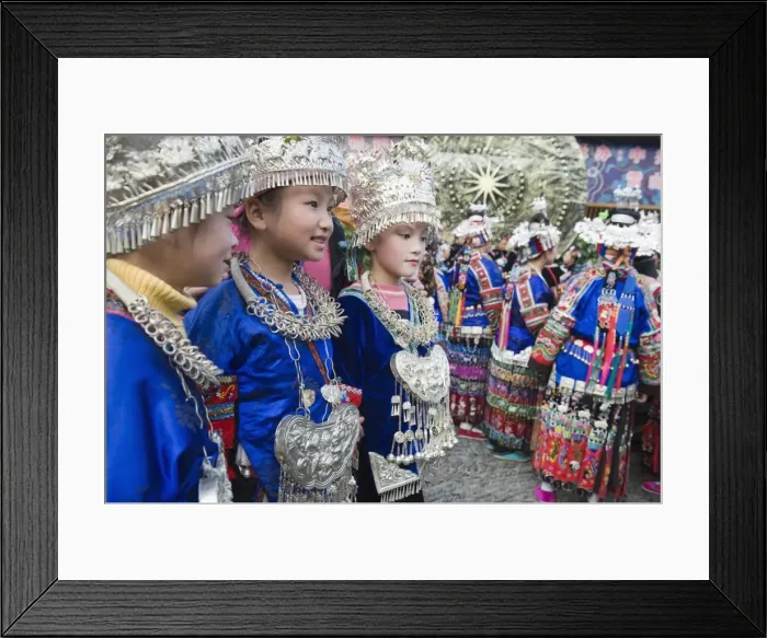 Framed Print : Elaborate costumes worn at a traditional Miao New Year festival in Xijiang Framed Print : Elaborate costumes worn at a traditional Miao New Year festival in Xijiang