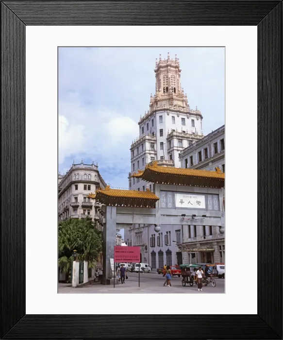 Framed Print : Gate to Barrio Chino (Chinatown) with the original headquarters of the Compan?a Cubana de Telefonos dating from 1927, in the background, Central Havana, Cuba, West Indies