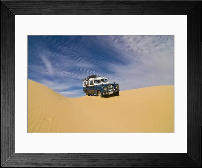 Framed Print : Jeep driving through the high sand dune of the Western Desert, near Siwa Framed Print : Jeep driving through the high sand dune of the Western Desert, near Siwa