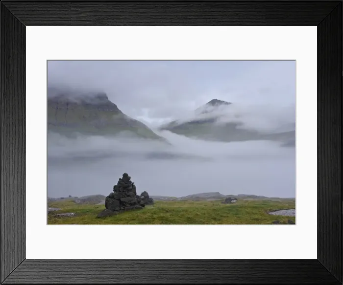 Framed Print : Slaettaratindur peak, highest point in Faroes at 882m, emerging from the mist Framed Print : Slaettaratindur peak, highest point in Faroes at 882m, emerging from the mist