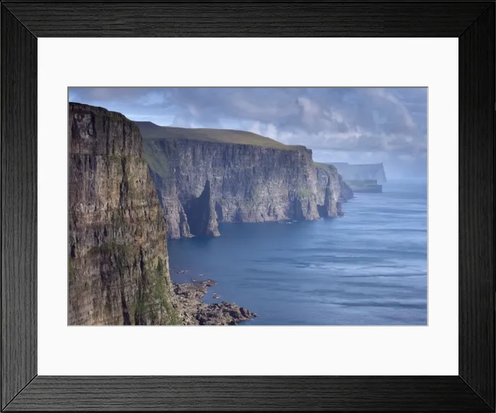 Framed Print : High cliffs between 200 and 300m high, on west coast of Sandoy, Svartskorardrangur Framed Print : High cliffs between 200 and 300m high, on west coast of Sandoy, Svartskorardrangur