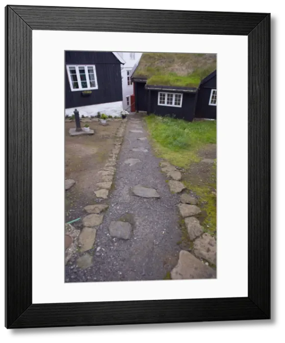 Framed Print : Old houses and turf-roofed buildings in historic Tinganes district, Torshavn Framed Print : Old houses and turf-roofed buildings in historic Tinganes district, Torshavn
