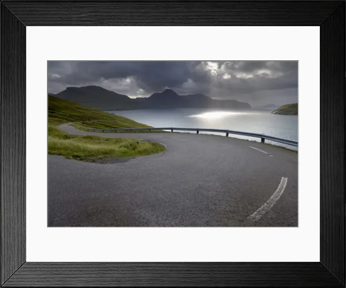 Framed Print : Winding road near Kvivik, and Vestmannasund between Vagar on the right