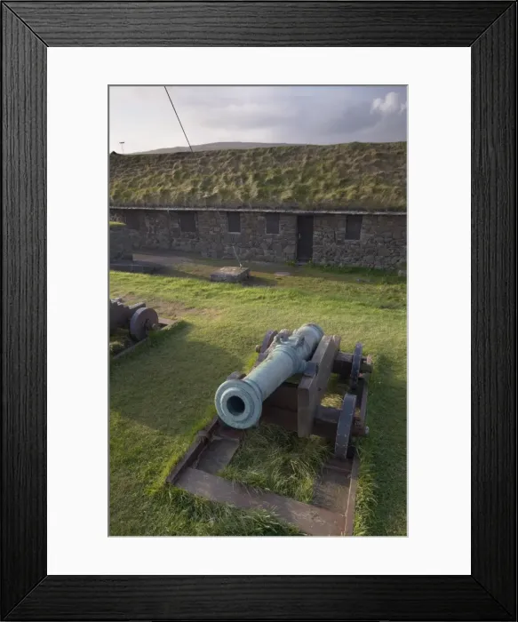 Framed Print : Skansin fort, old fort guarding Torshavn and its harbour (old brass cannons Framed Print : Skansin fort, old fort guarding Torshavn and its harbour (old brass cannons