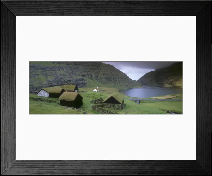 Framed Print : Traditional turf roofed farm buildings and church, Saksun, Streymoy Island Framed Print : Traditional turf roofed farm buildings and church, Saksun, Streymoy Island