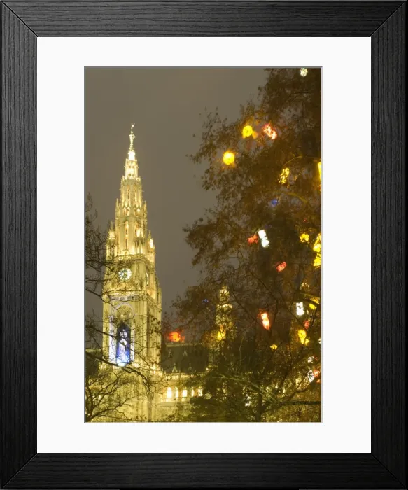 Framed Print : Tree decorated with lit Christmas presents and Rathaus (Town Hall) tower at Rathausplatz at twilight, Innere Stadt, Vienna Framed Print : Tree decorated with lit Christmas presents and Rathaus (Town Hall) tower at Rathausplatz at twilight, Innere Stadt, Vienna
