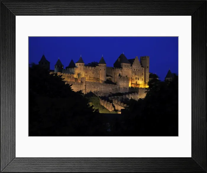 Framed Print : Floodlit view of the walled and turreted fortress of La Cite, Carcassonne Framed Print : Floodlit view of the walled and turreted fortress of La Cite, Carcassonne