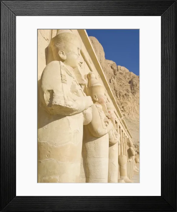 Framed Print : Restored Osirid statues of the female pharaoh Hatshepsut on the pillars of the portico entrance to the third terrace of theTemple of Hatshepsut, Deir el Bahari, West bank of the River Nile, Thebes, UNESCO World Heritage Site, Egypt, North