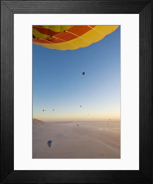 Framed Print : Lots of hot air balloons flying over the desert at sunrise west of the river Nile near Luxor Framed Print : Lots of hot air balloons flying over the desert at sunrise west of the river Nile near Luxor