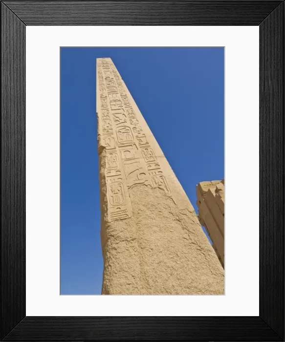 Framed Print : Giant granite obelisk decorated with hieroglyphics at the great Temple at Karnak near Luxor Framed Print : Giant granite obelisk decorated with hieroglyphics at the great Temple at Karnak near Luxor