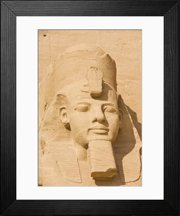 Framed Print : Close up of the head of a giant statue of the great pharaoh Rameses II outside the relocated Temple Rameses II at Abu Simbel, UNESCO World Heritage Site, Egypt, North
