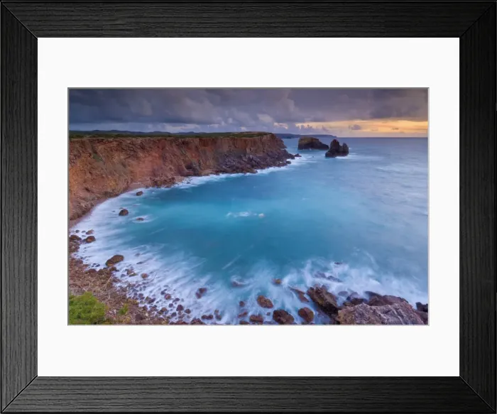 Framed Print : Stormy sunset sky with milky tide and surf taken on a slow shutter speed Framed Print : Stormy sunset sky with milky tide and surf taken on a slow shutter speed