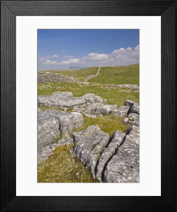 Framed Print : Limestone pavement and dry stone wall above Settle, Yorkshire Dales National Park Framed Print : Limestone pavement and dry stone wall above Settle, Yorkshire Dales National Park