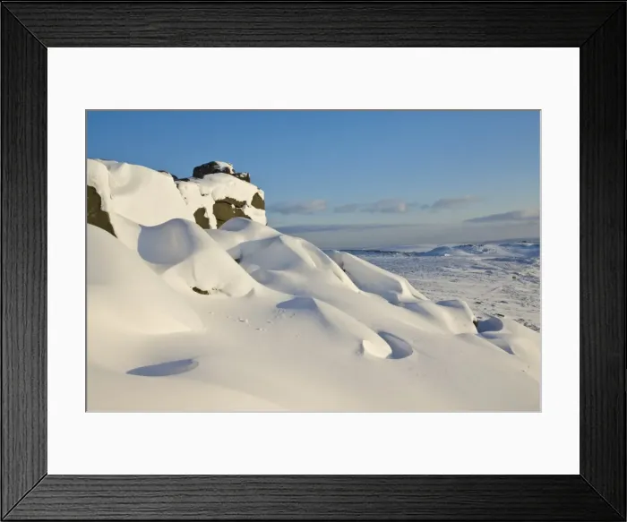 Framed Print : Snow drifts and snow covered moorland at Stanage Edge, Peak District National Park Framed Print : Snow drifts and snow covered moorland at Stanage Edge, Peak District National Park